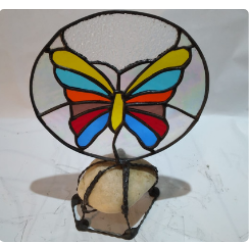Butterfly on a stone with ring